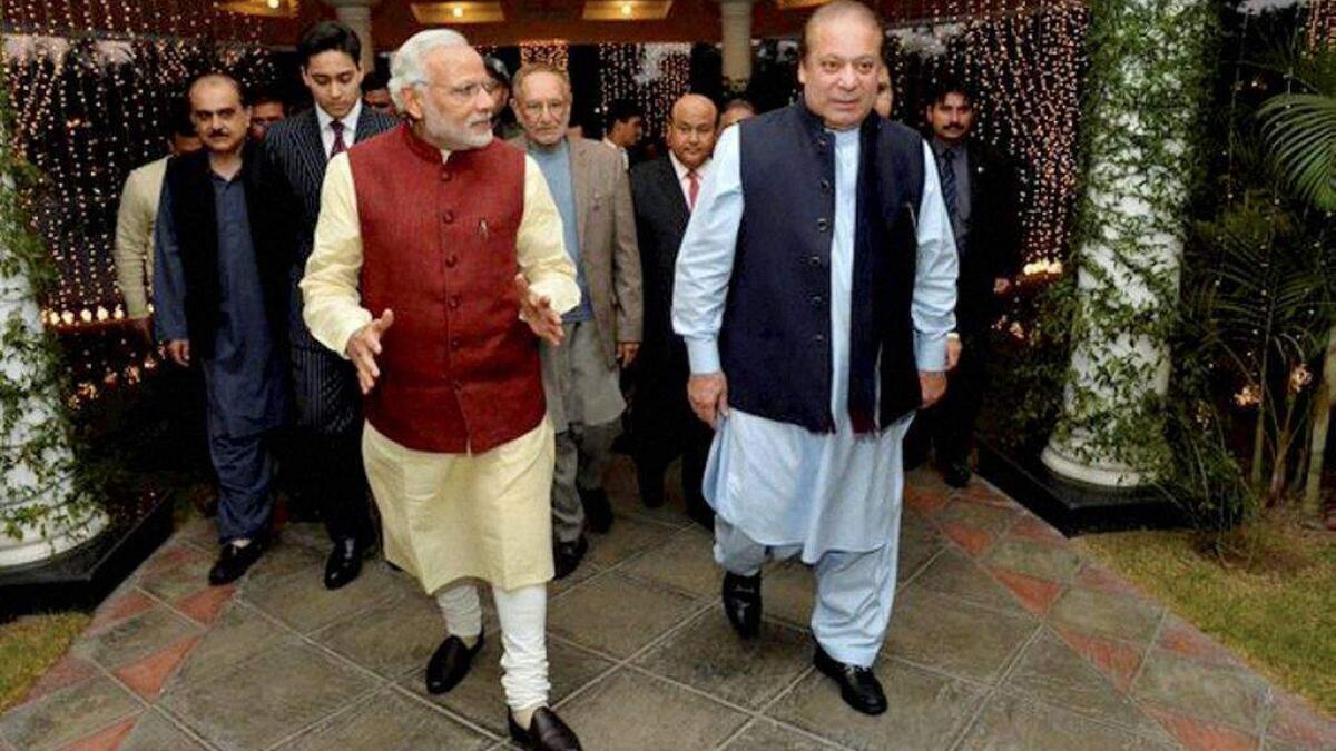 Modi touches Pakistani PM mothers feet as mark of respect