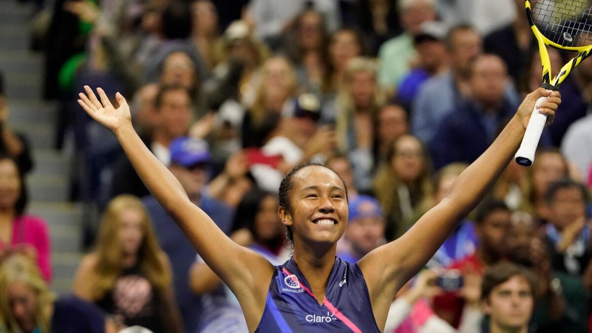 Leylah Fernandez of Canada reacts after defeating Naomi Osaka during the third round of the US Open tennis championships. — AP