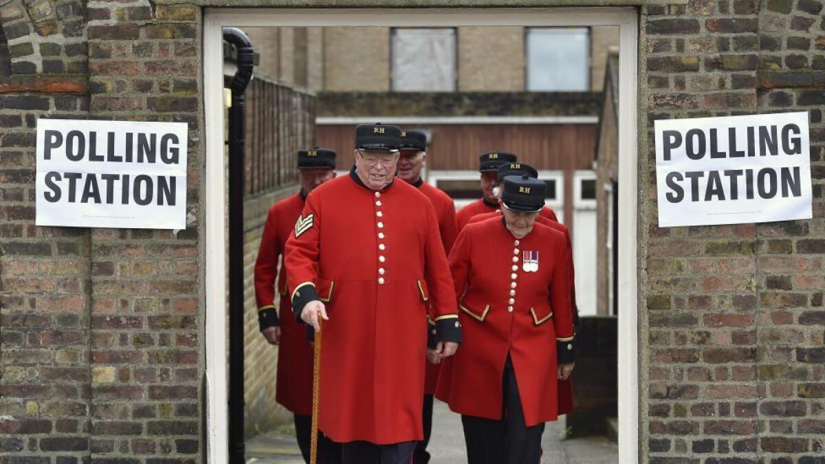 Chelsea Pensioners leave after voting in the EU referendum, at a polling station in Chelsea in London