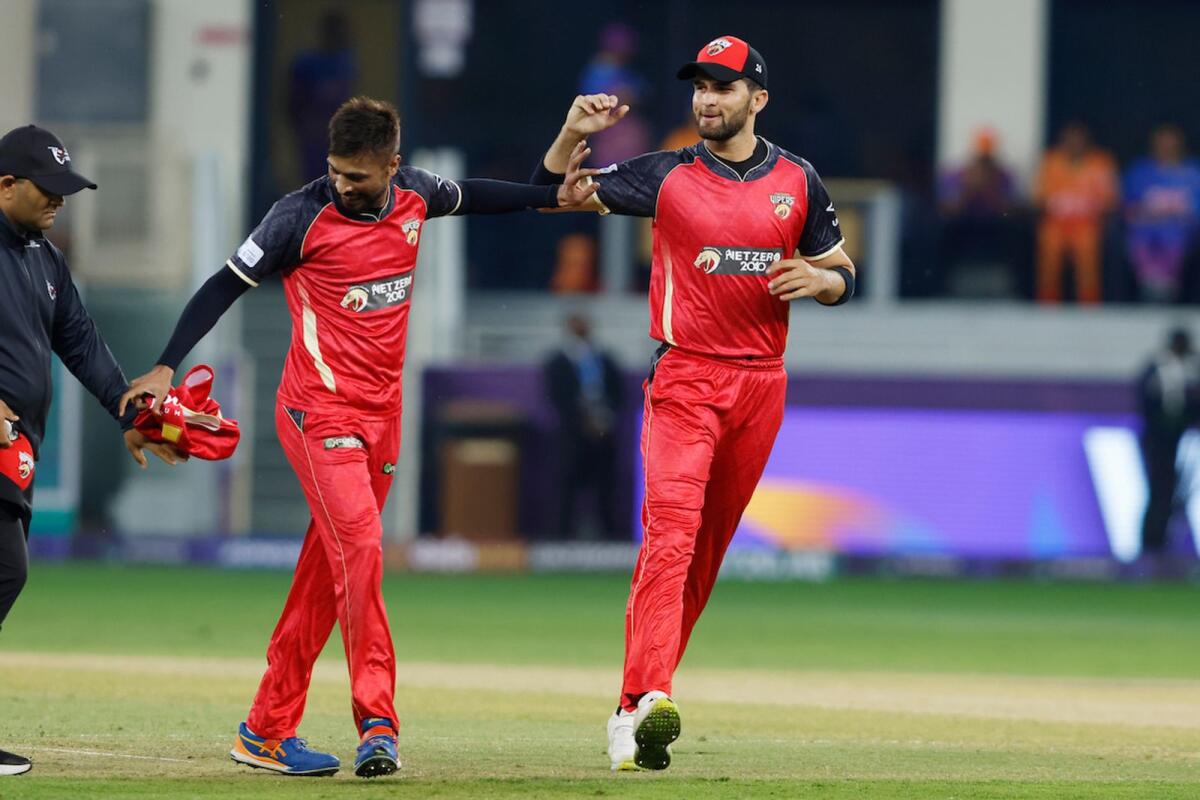 Mohammad Amir and Shaheen Shah Afridi of Desert Vipers celebrate the wicket of James Vince. — ILT20