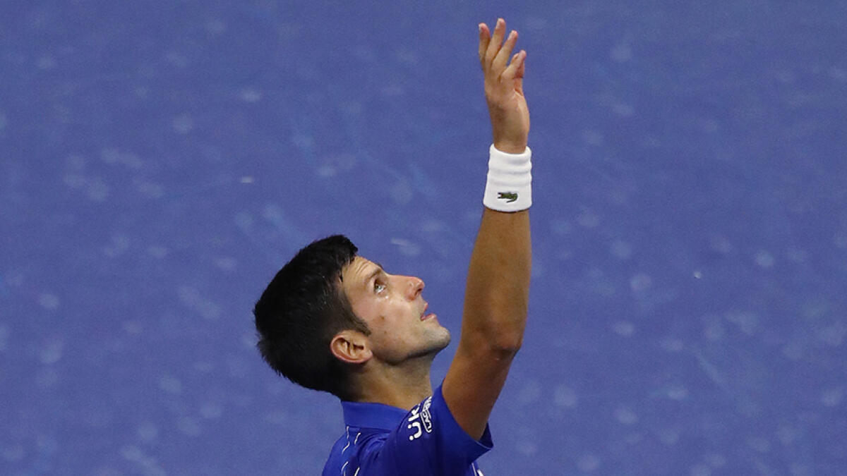 Novak Djokovic celebrates after winning his first round match against Damir Dzumhur of Bosnia and Herzegovina on Day One of the 2020 US Open. -- AFP