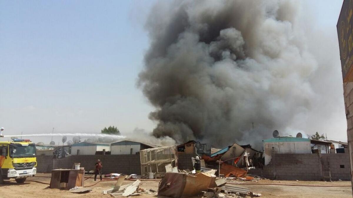 100 workers escape death after massive fire in labour camp