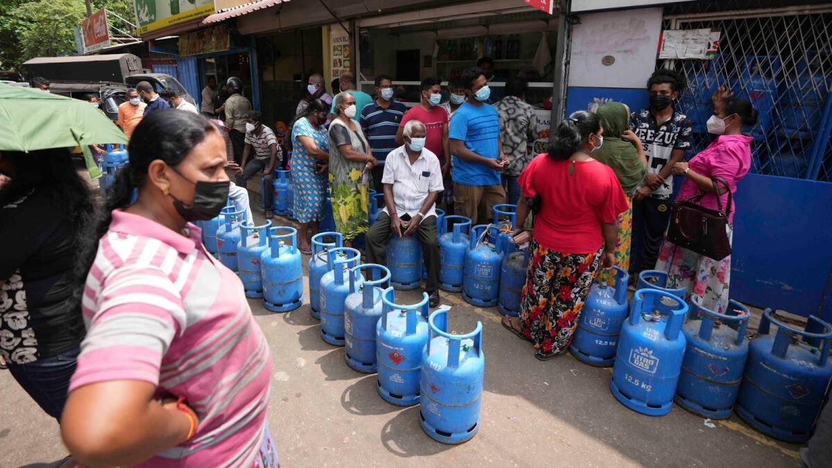 Earlier this month, Sri Lanka’s president requested people’s support by limiting electricity and fuel consumption to cope with the worst economic crisis. (AP)