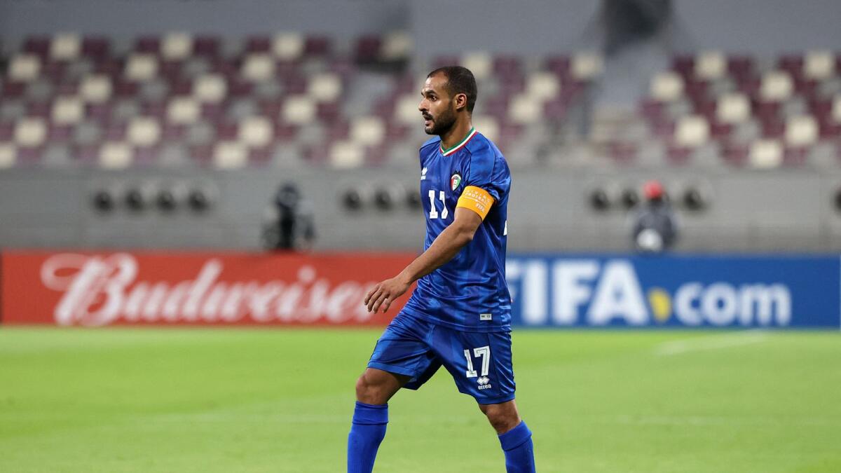 Kuwait's forward and captain Bader Al Mutawa walks with the ball during the 2021 Fifa Arab Cup qualifier match between Bahrain and Kuwait at Khalifa International Stadium in Doha. — AFP