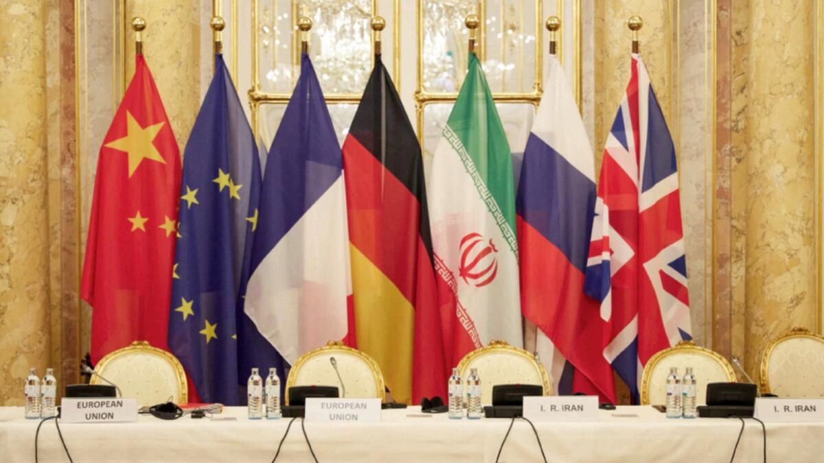 Flags of participating states during a meeting of the joint commission on negotiations aimed at reviving the Iran nuclear deal in Vienna. — AFP