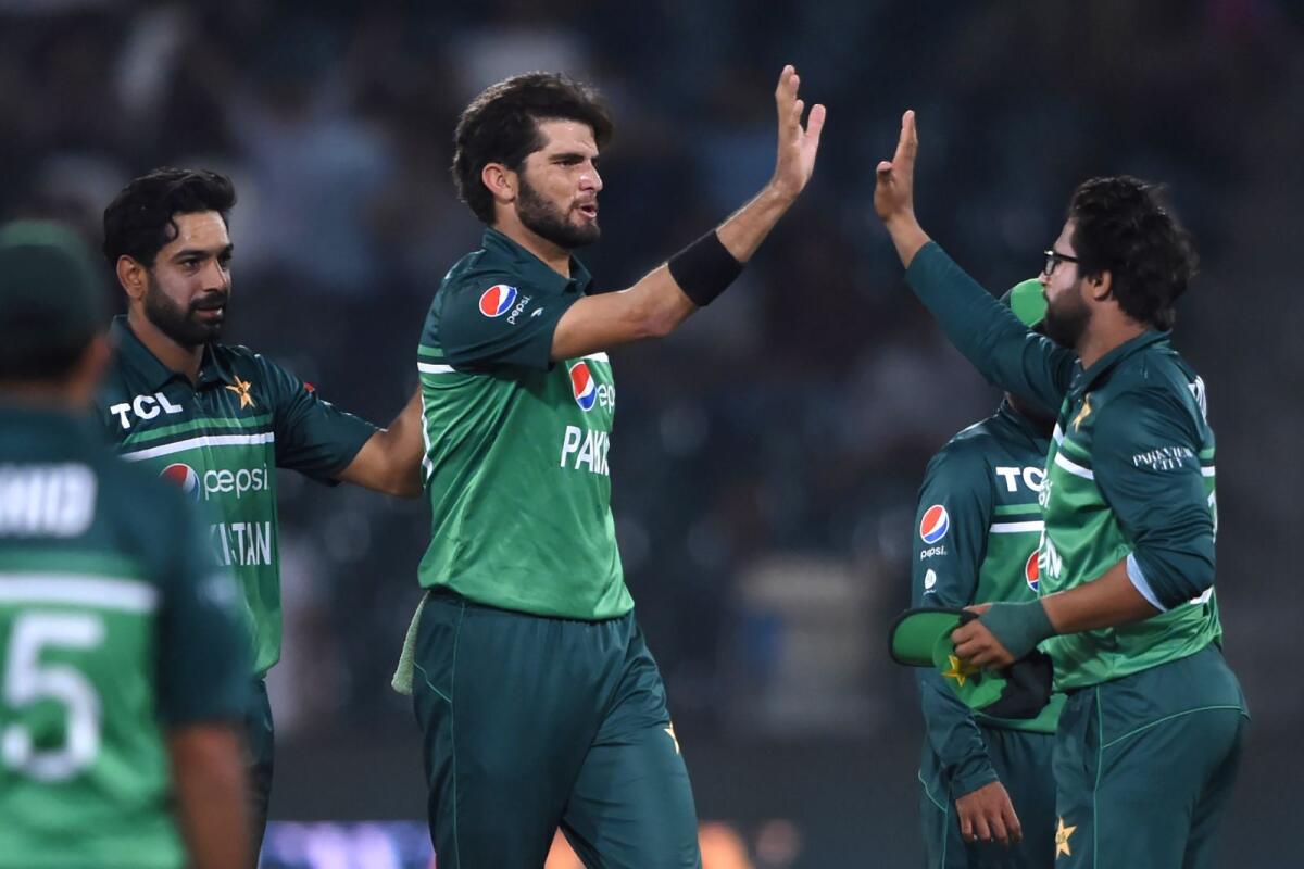 Pakistan fast bowler Shaheen Shah Afridi (centre) celebrates a wicket with teammates. (AFP file)