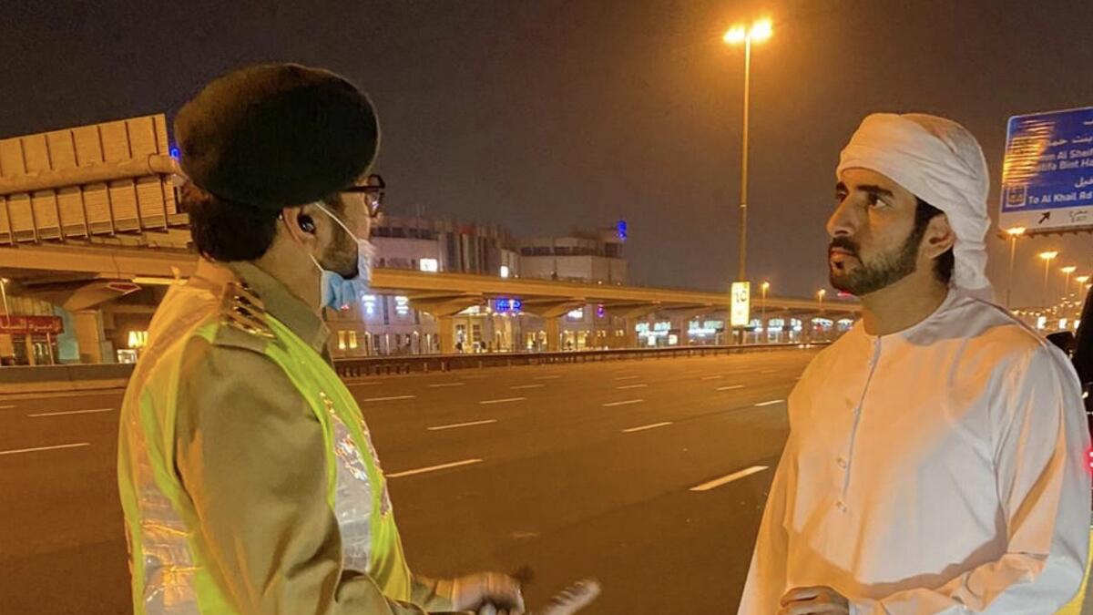Combating, Covid-19, Sheikh Hamdan, inspects, police patrol, work, Sheikh Zayed Road 