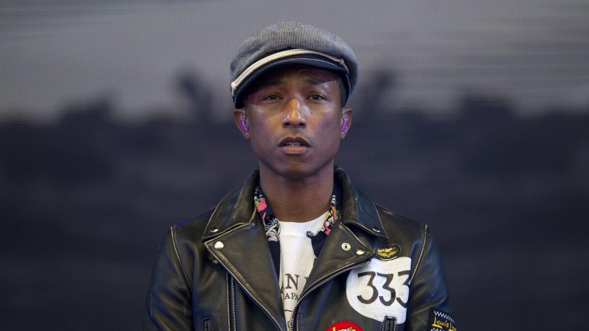 Pharrell Williams dedicates Freedom song to migrants