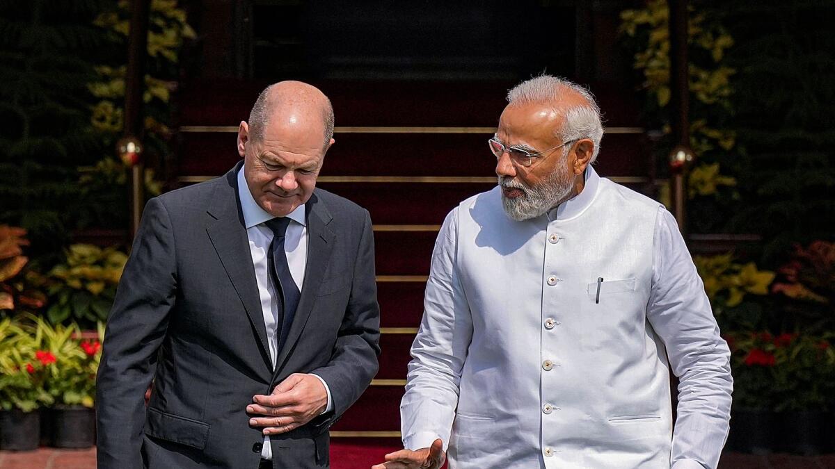 Prime Minister Narendra Modi with German Chancellor Olaf Scholz prior to their meeting at the Hyderabad House in New Delhi. — PTI