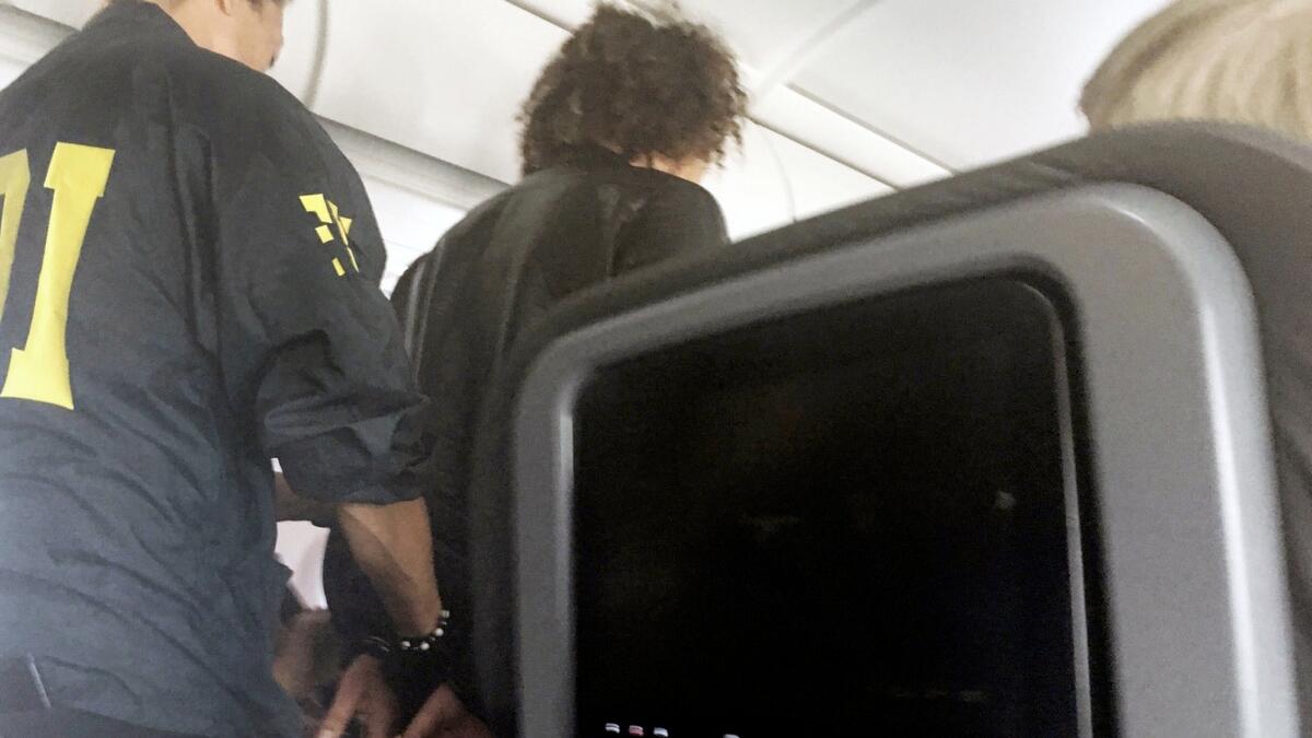 Man attempts to break into cockpit on American Airlines flight