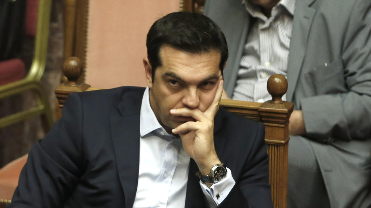 Greece seeks relief from lenders after first bailout test