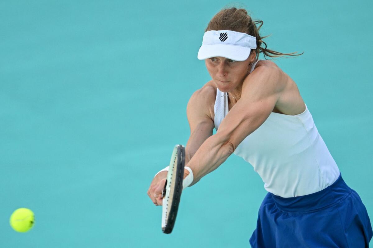 Russia's Liudmila Samsonova hits a return against Barbora Krejcikova of the Czech Republic during the women's singles quarterfinal match at the Mubadala Abu Dhabi Open. - AFP