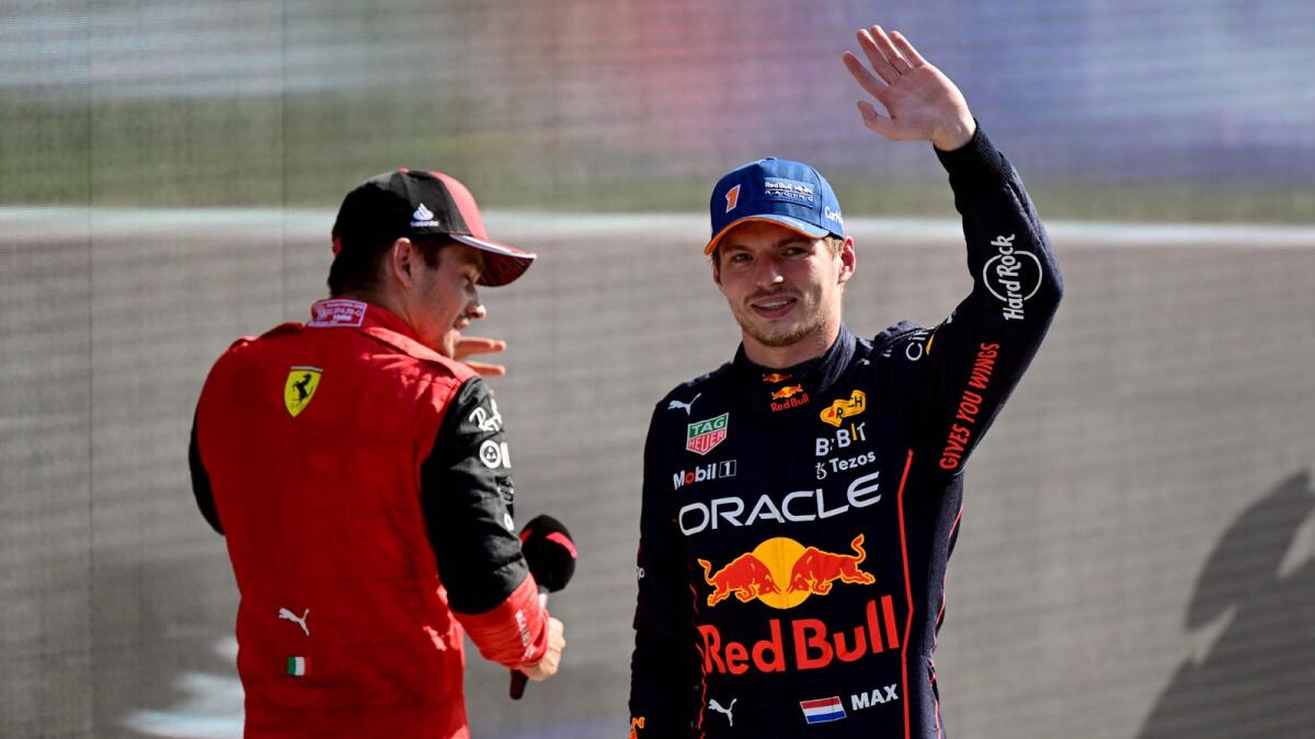 Red Bull Racing's Dutch driver Max Verstappen (right) salutes the crowd. (AFP)