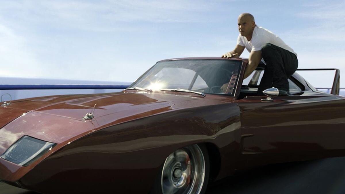 6) Dom dives to save Letty (Fast and Furious 6 - 2013).  After Fast and Furious (2009), the franchise became more than just racing cars. We started seeing physics-defying stunts, crazy action sequences, and Dom and the team taking on entire armies. One of those stunts took place in Fast and Furious 6 when Dom crashes his car into the guardrail of a two-lane highway to fly over to another two-lane highway to catch his girlfriend Letty midair and land safely. Do not tell us romance is dead.