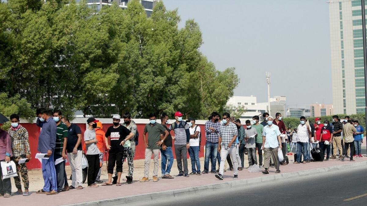 Long queues, rapid, Covid-19 test centre, Dubai, Al Ahli football club,