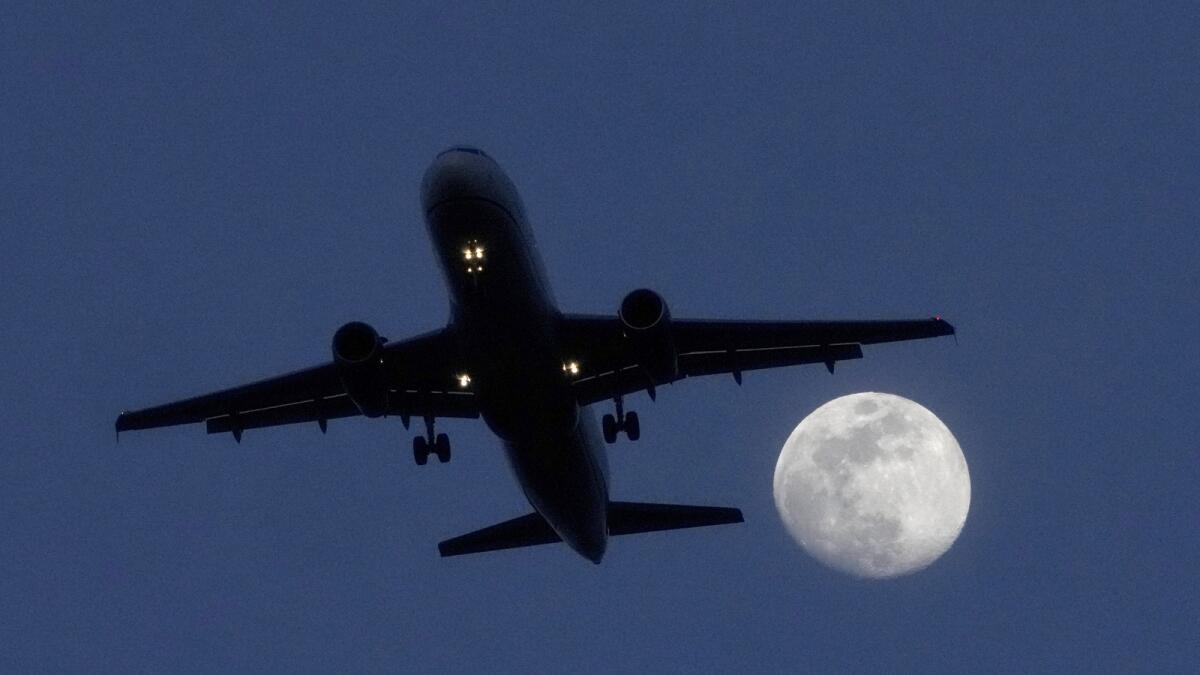 A commercial airliner approaches Chicago's O'Hare International Airport. Cracked windshields on jetliners and engine problems that cause flight delays don't normally attract much attention, but routine and rare problems with passenger planes are attracting an unusual amount of news coverage. — AP