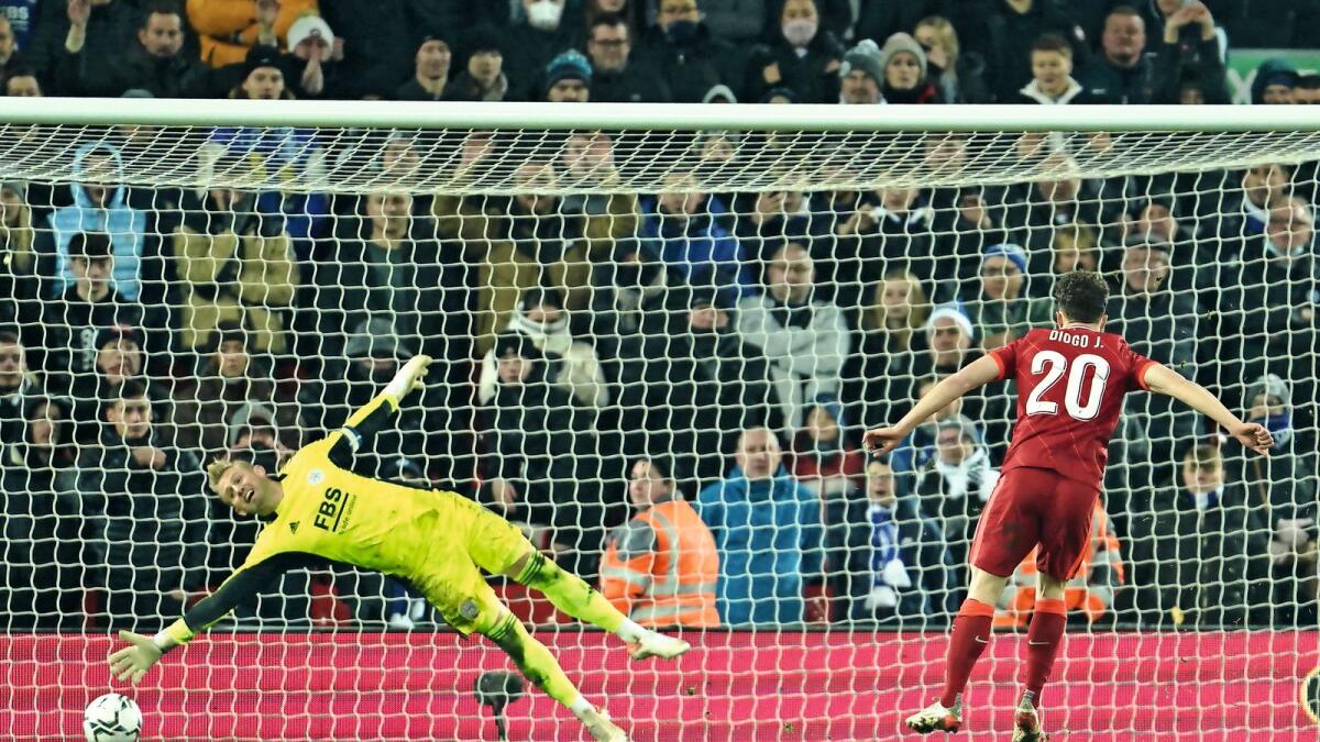 Gooooooaaal!: Liverpool’s Diogo Jota scores the winning penalty past Leicester goalkeeper Kasper Schmeichel in the League Cup quarterfinal at Anfield. — AP