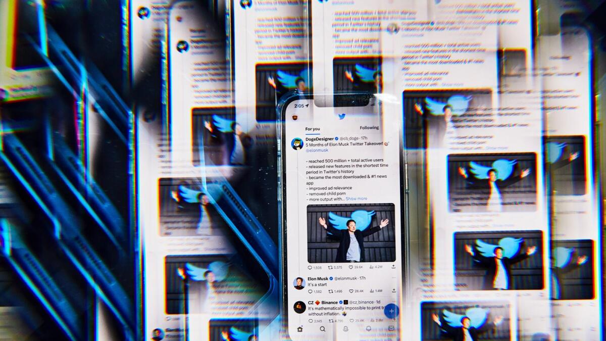A photo illustration shows numerous mobile screens displaying a Twitter Feed. Nearly six months into his takeover of Twitter, Elon Musk has tinkered with the algorithm that decides which posts are most visible, thrown out content moderation rules that ban certain kinds of tweets and changed a verification process that confirms the identities of users. (Amy Lombard/The New York Times)