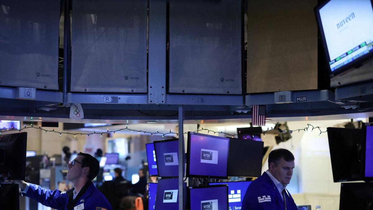 Traders work on the trading floor at the New York Stock Exchange. Fourth-quarter earnings in the tech sector are expected to have declined 9.1 per cent from a year ago, compared to a 2.8 per cent decline for S&amp;P 500 earnings overall, according to Refinitiv IBES. - Reuters