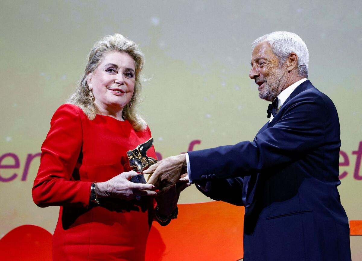 Catherine Deneuve receives the Golden Lion award for lifetime achievement