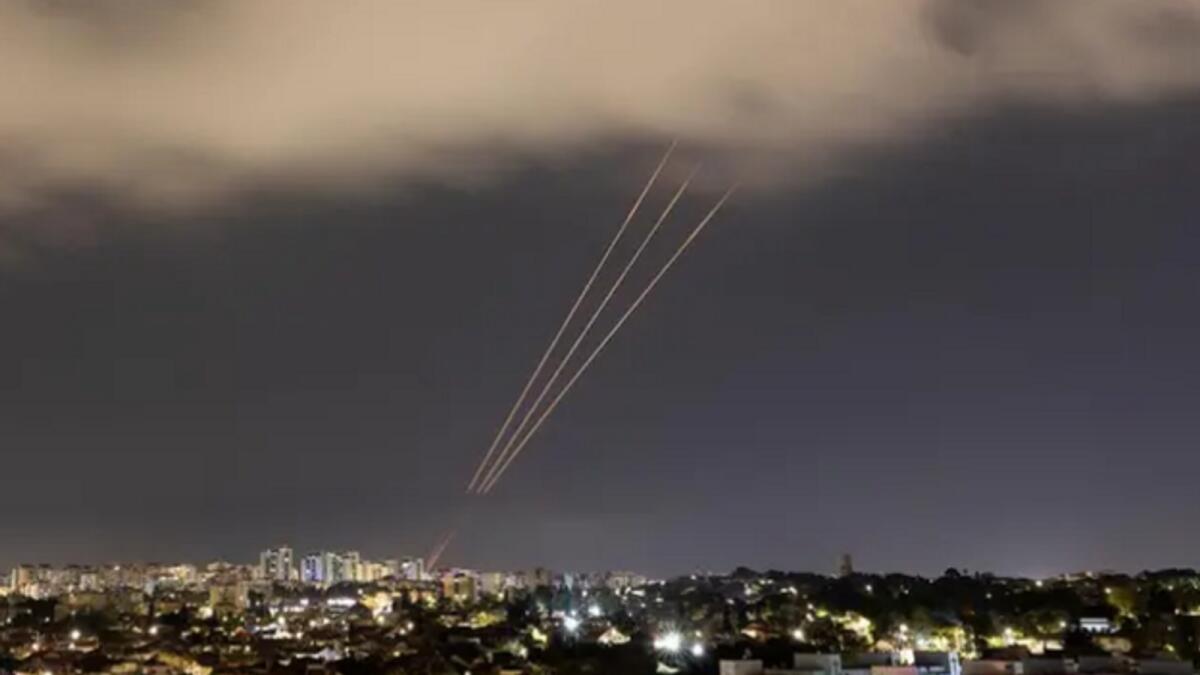 An anti-missile system operates after Iran launched drones and missiles towards Israel. Photo: Reuters