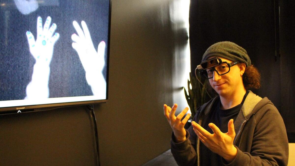 David Holz at the San Francisco startup’s headquarters demonstrates finger tracking technology that lets people use natural hand movements to interact with virtual worlds. 