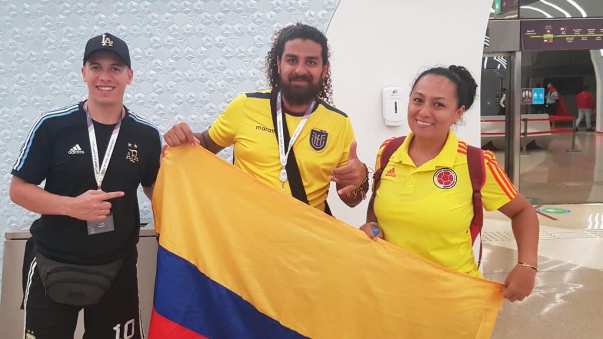 Argentina fan Damian (left) with Colombian siblings, Cristian (centre) and Paula. – Photo: Rituraj Borkakoty