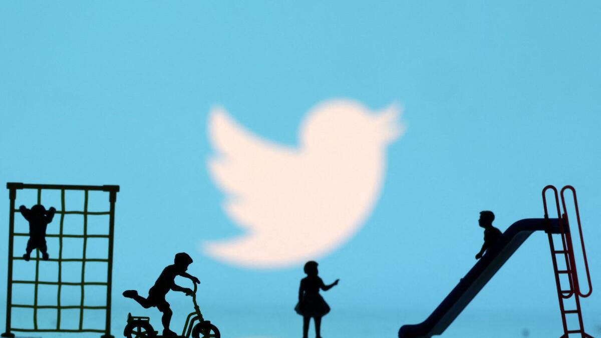 Children playground miniatures are seen in front of displayed Twitter logo in this illustration taken April 4, 2023. — Reuters