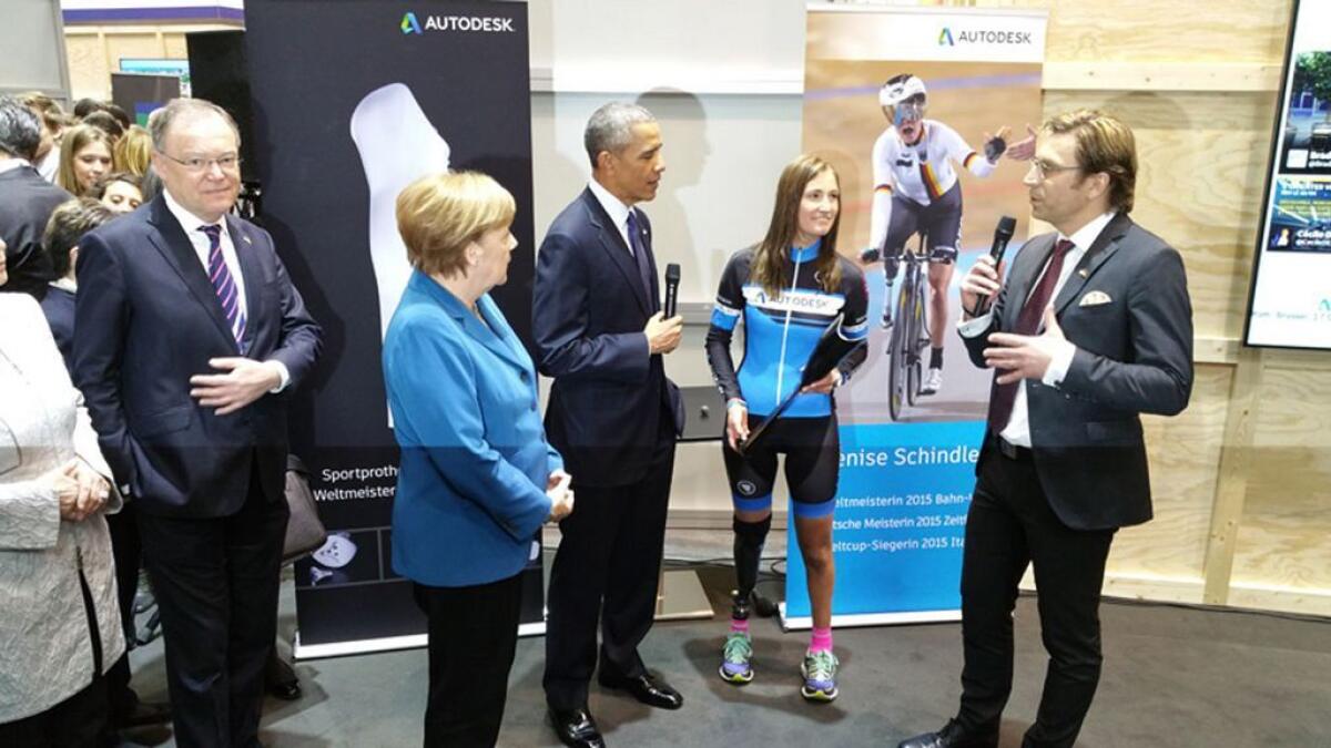 Paralympian Denise Schindler (second from right) discussing her new prosthetic with US President Barack Obama and German Chancellor Angela Merkel last month