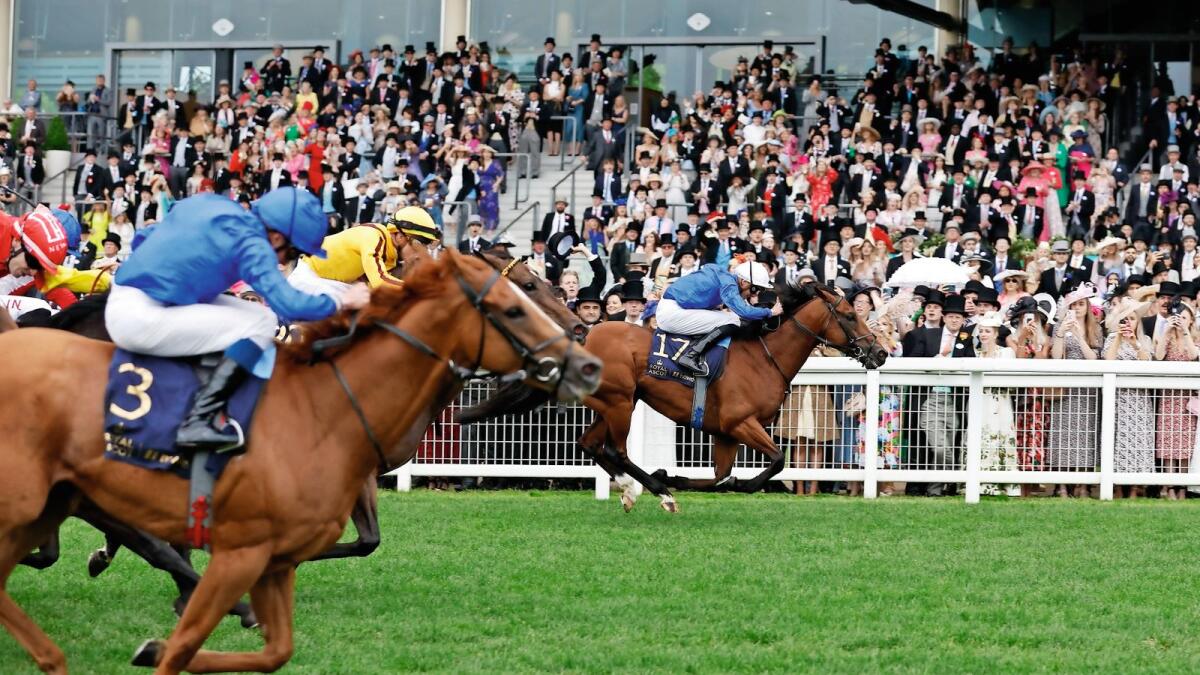 Grandstand finish: Naval Crown (right), ridden by James Doyle, wins the Platinum Jubilee Stakes as Creative Force, ridden by William Buick, places second, at Royal Ascot on Saturday. — Reuters