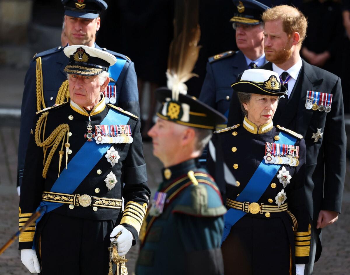 Britain's King Charles III (L), Britain's Princess Anne (R), Princess Royal, Britain's Prince William (back L), Prince of Wales, and Prince Britain's Prince Harry (back R), Duke of Sussex, stand outside Westminster Abbey. Photo: AFP