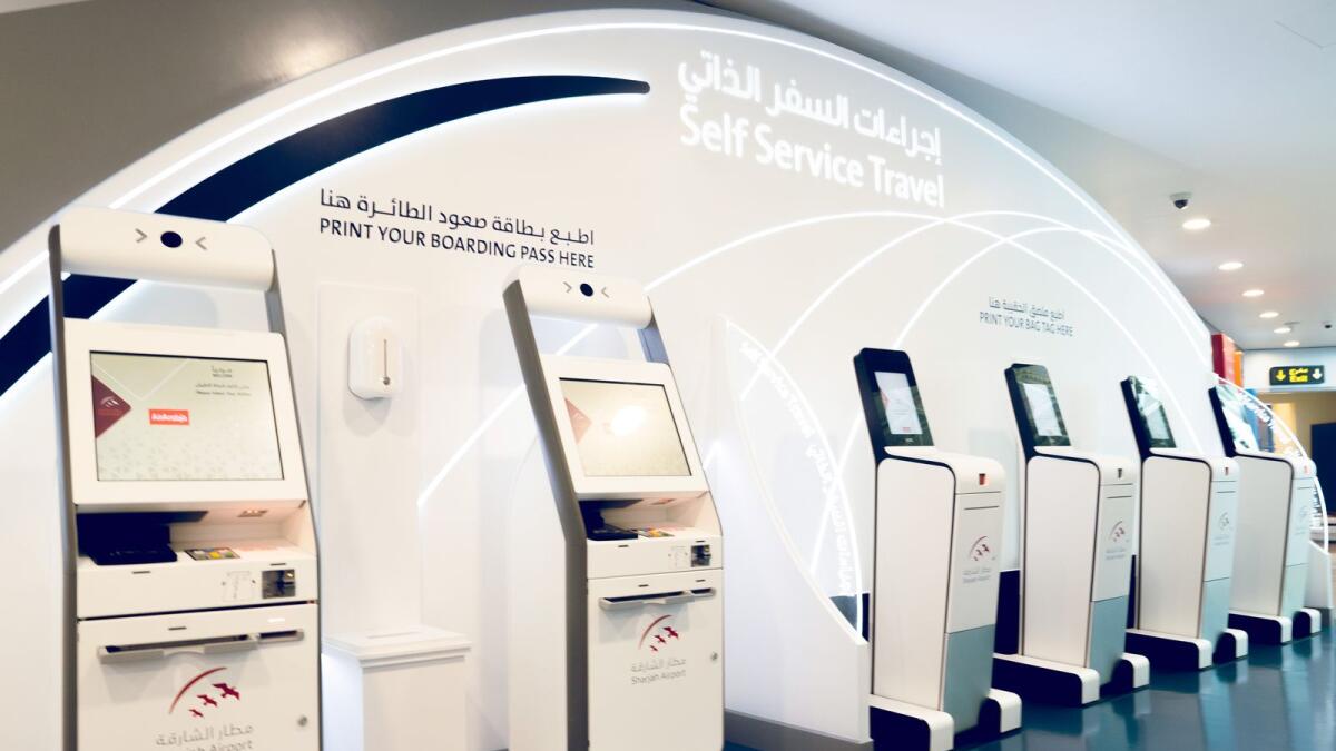 Self check-in counters at Sharjah airport. — Supplied photo