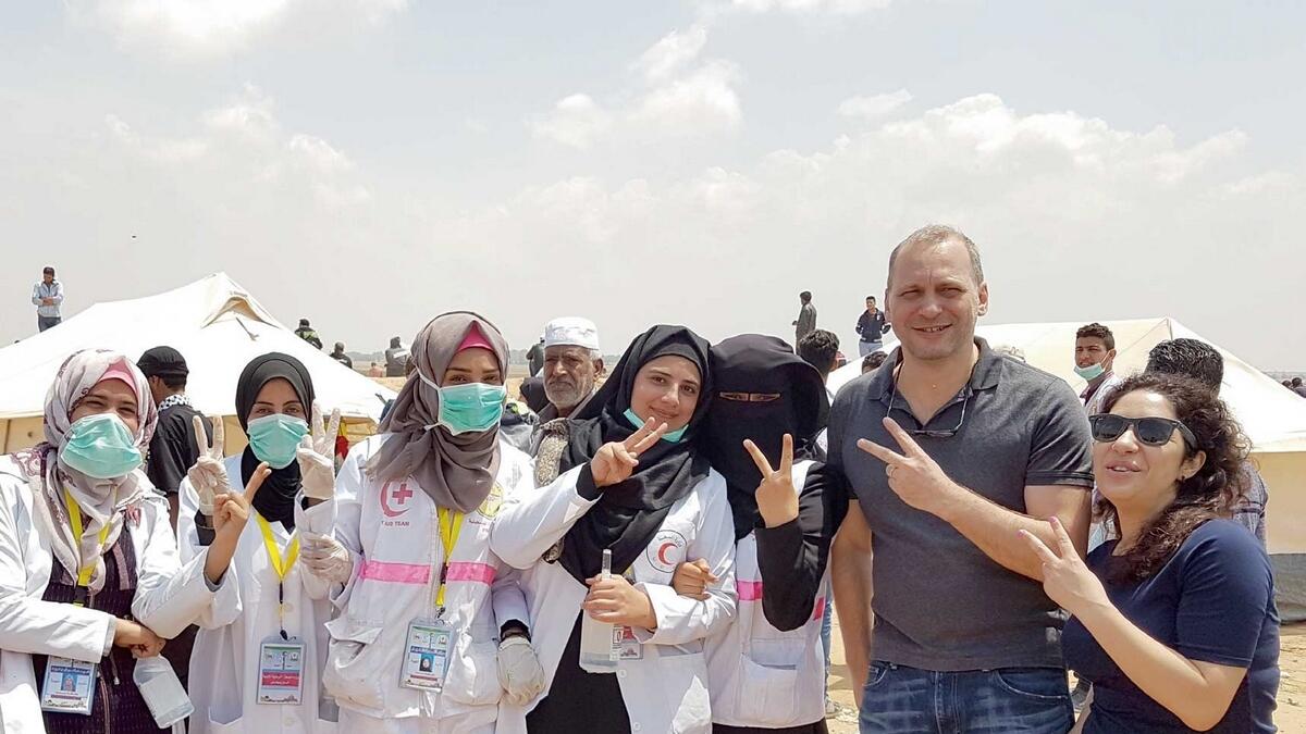 Dr Marc Sinclair with volunteers and Razan Al Najjar (third from left) in Palestine.- Supplied photo