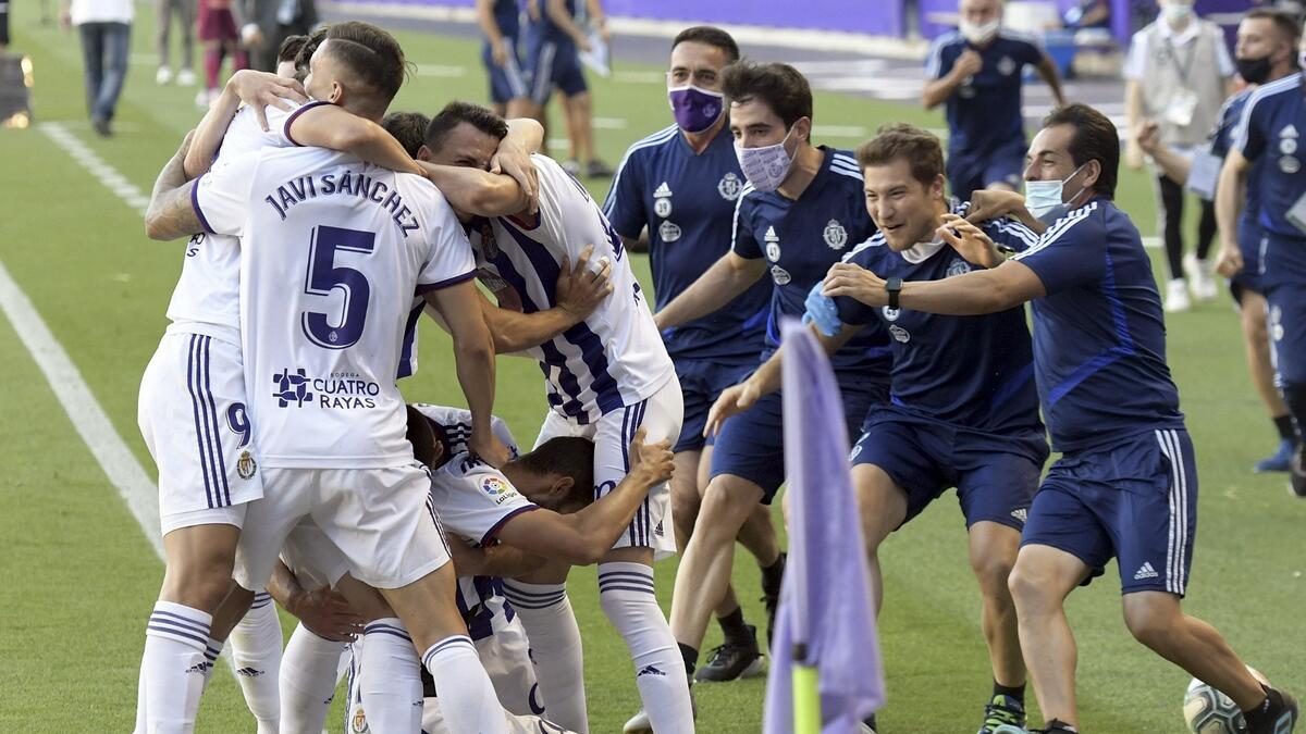 Real Valladolid players celebrate after Joaquin Fernandez scored the winner. - (La Liga English Twitter)