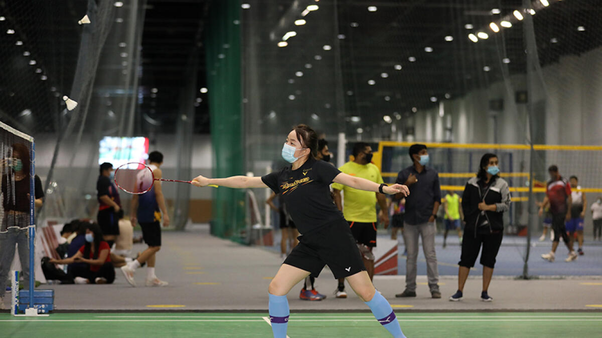 A participant in action during the Dubai Sports Community Club's badminton tournament. -- Supplied photo