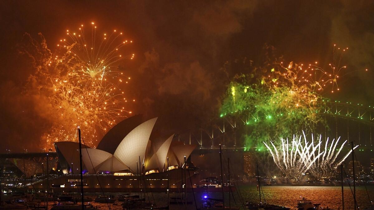 Fireworks explode over Sydney Harbour during New Years Eve celebrations in Sydney, Australia.- AP