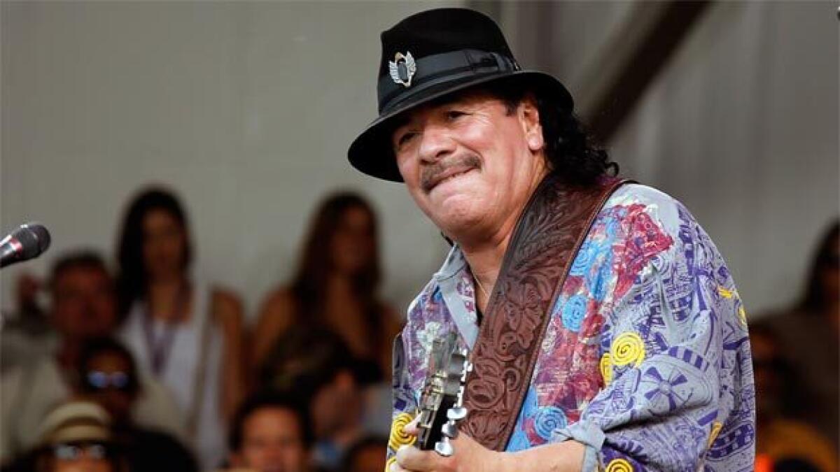 Carlos Santana wants to save the world with music