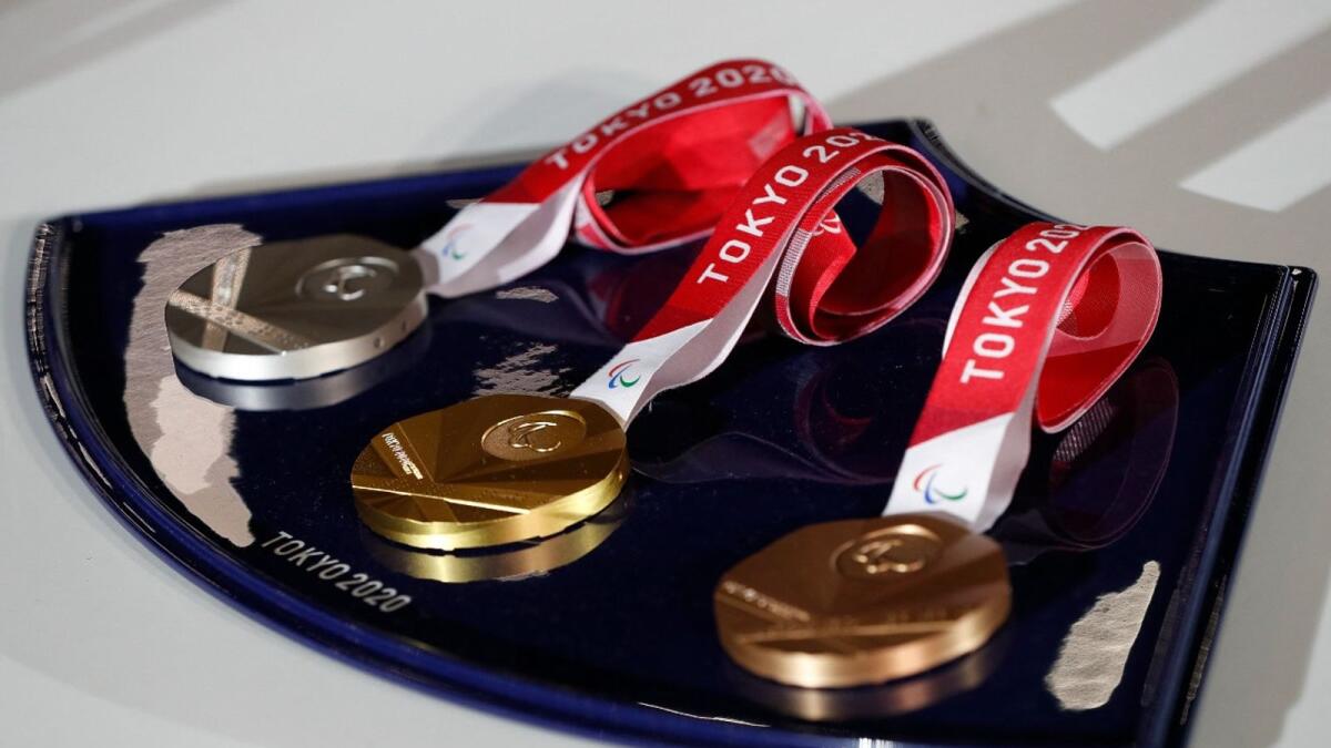 The Tokyo 2020 Olympic medals are made from recycled electronic devices donated by citizens. (AFP)