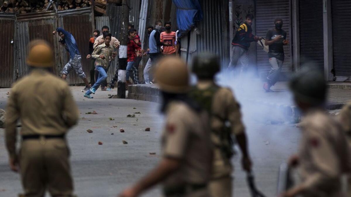 Around 100 injured in clashes in Kashmir