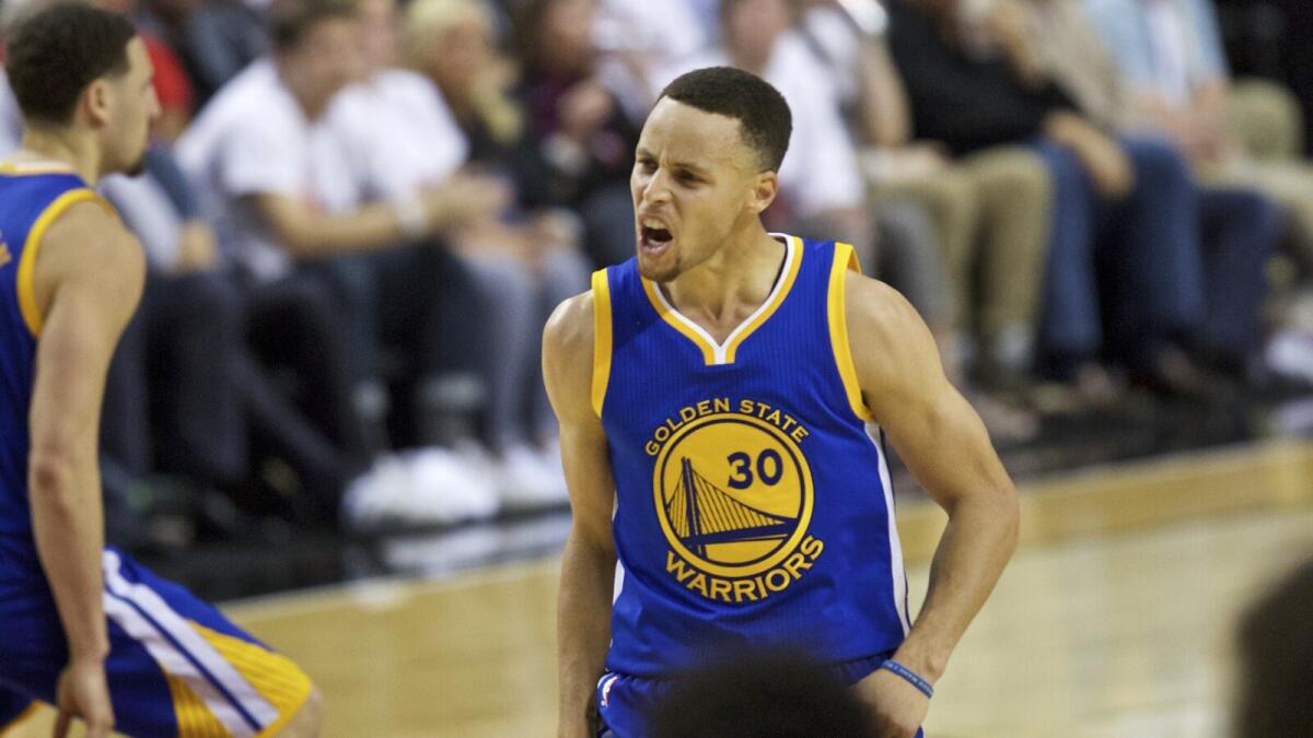 Golden State Warriors guard Stephen Curry reacts after making a basket against the Portland Trail Blazers during the second half of Game 4 of an NBA basketball second-round playoff series Monday, May 9, 2016, in Portland, Ore. (AP Photo/Craig Mitchelldyer)