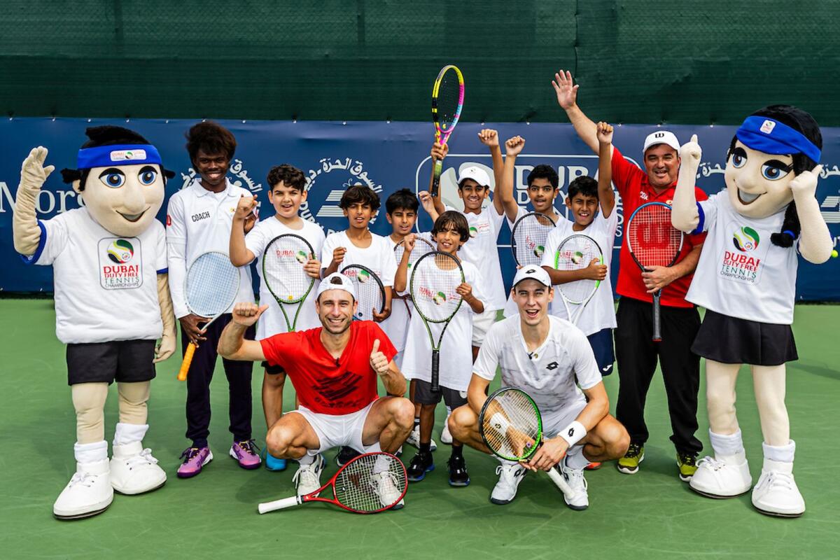 Sander Gille and Joran Vliegen with the young UAE tennis players. — Supplied photo