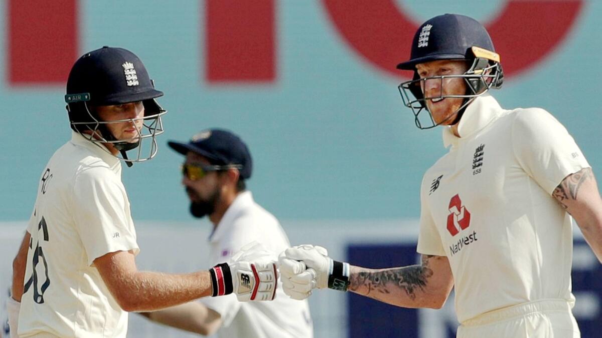 Ben Stokes and Joe Root during the 2nd day of first cricket Test match against India. — PTI