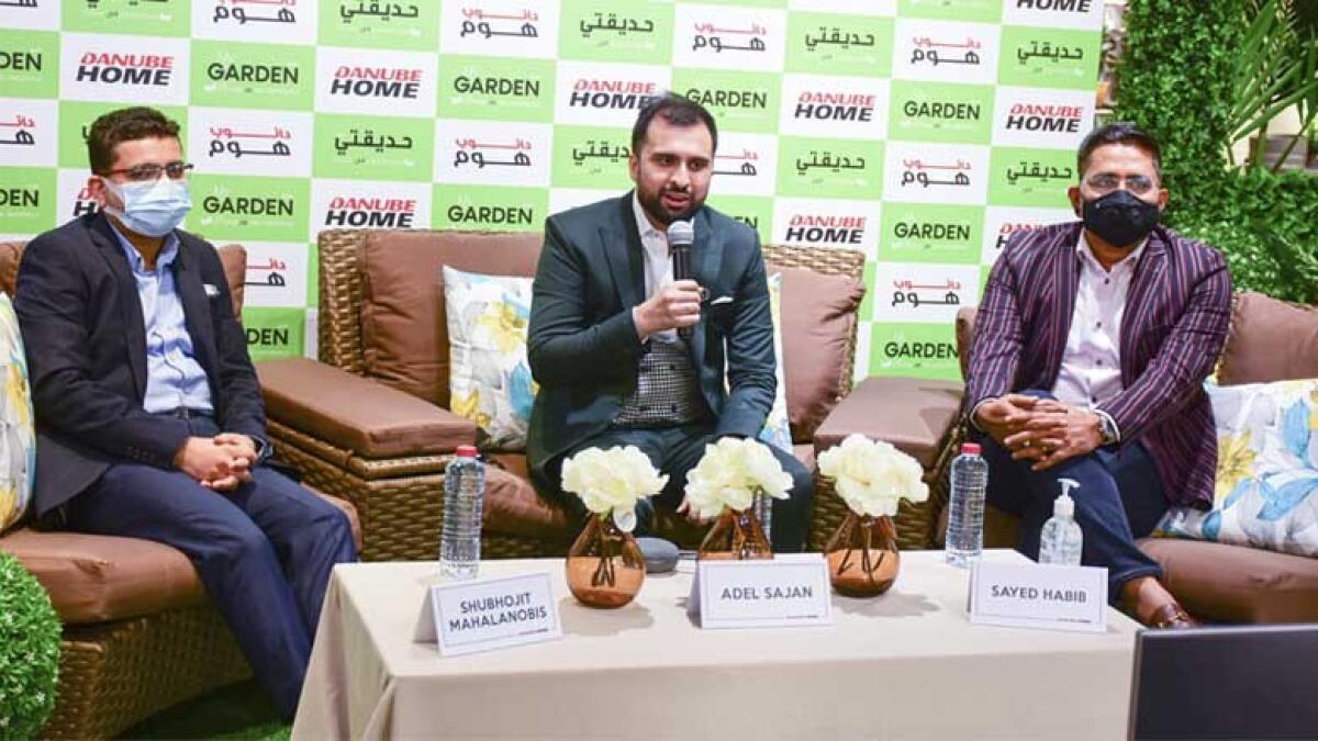 ITS GARDEN EVERYWHERE: Adel Sajan, director at Danube Home; Shubhojit Mahalanobis, general manager at Danube Home; and Sayed Habib, general manager, business development at Danube Home, during the launch of Danube Home's Garden e-Catalogue in Dubai on Thursday. - Photo by Shihab
