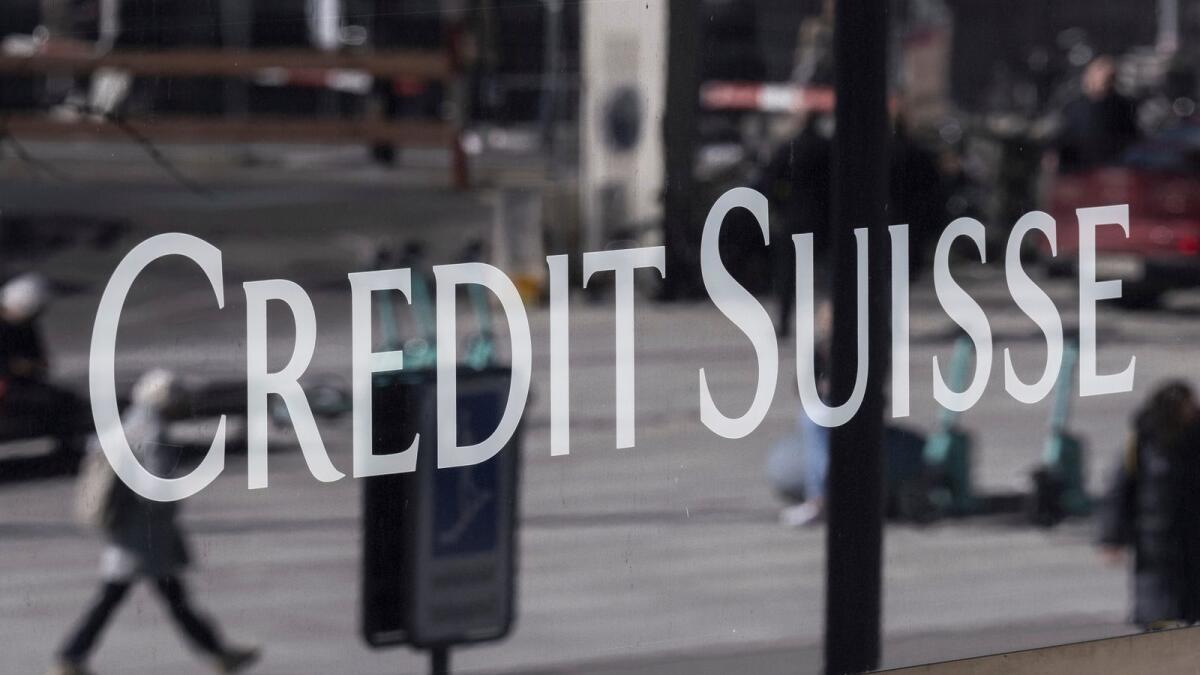 Efforts to shore up Credit Suisse come as policymakers sought to reassure investors and depositors the global banking system is safe. - AP