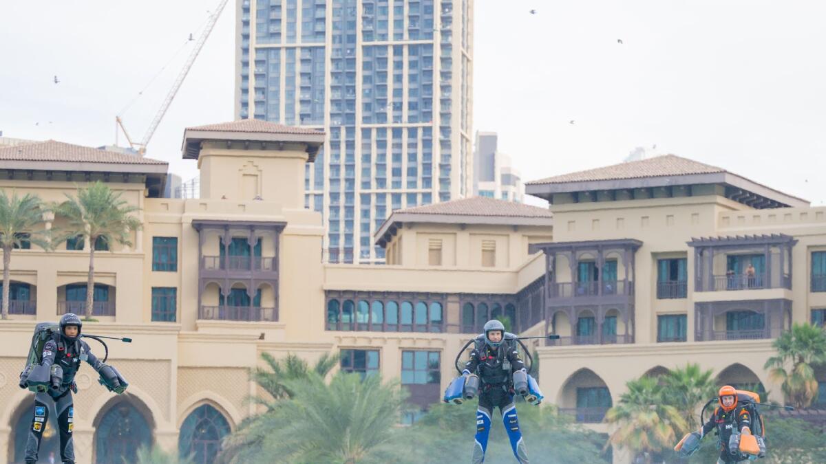 A live demonstration of jet suit race featuring three competitors who went whizzing over the Dubai Fountain. — Supplied photo