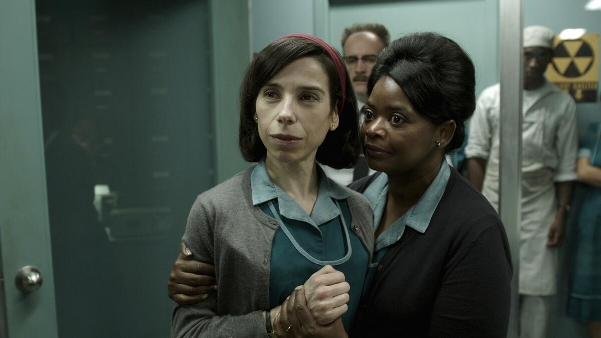 This image released by Fox Searchlight Pictures shows Sally Hawkins, left, and Octavia Spencer in a scene from 'The Shape of Water.'- AP