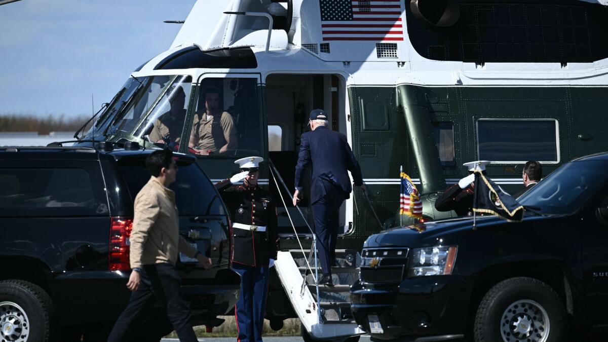 US President Joe Biden boards Marine One in Delaware as he returns to the White House. Photo: AFP