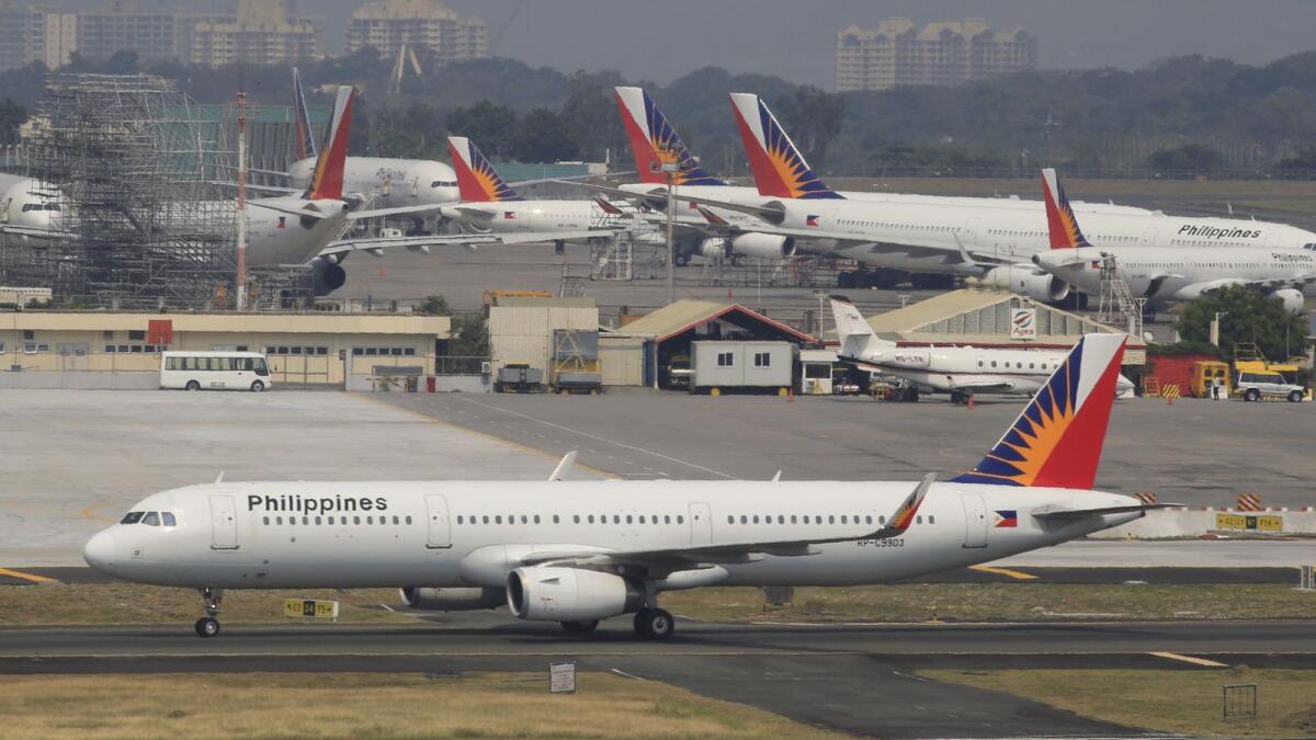 PAL will also downsize its fleet by 25 per cent and re-negotiate contracts to reduce lease payments. — File photo