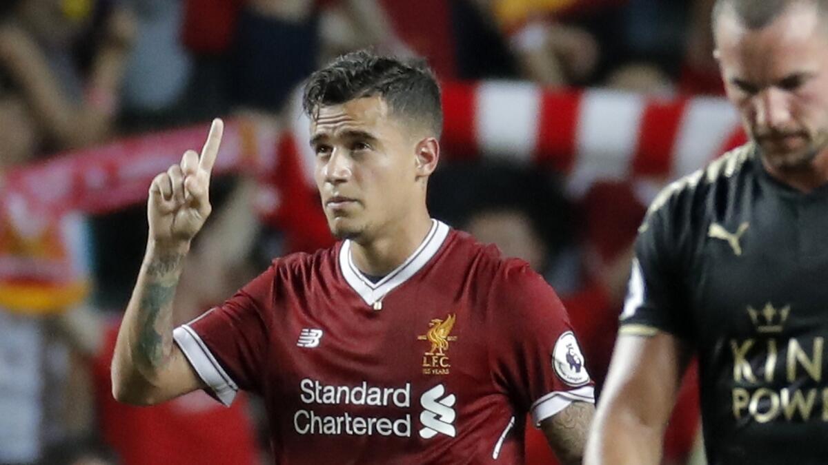 Liverpools wantaway Coutinho reports for training