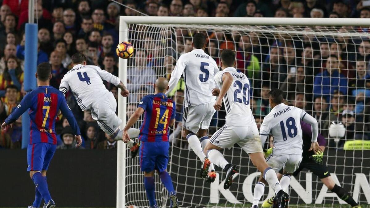 Ramos last-gasp goal helps Real hold Barca Ramos late goal helps Real hold Barcelona